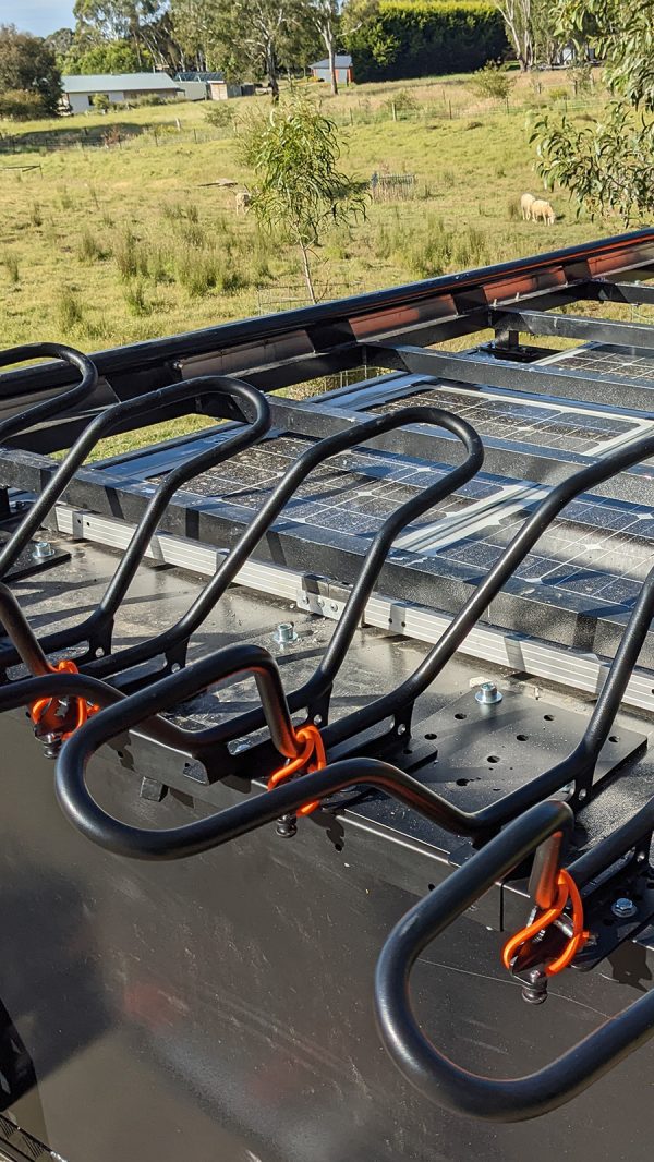 Shingleback Canopy rack with solar panels and roof top tents