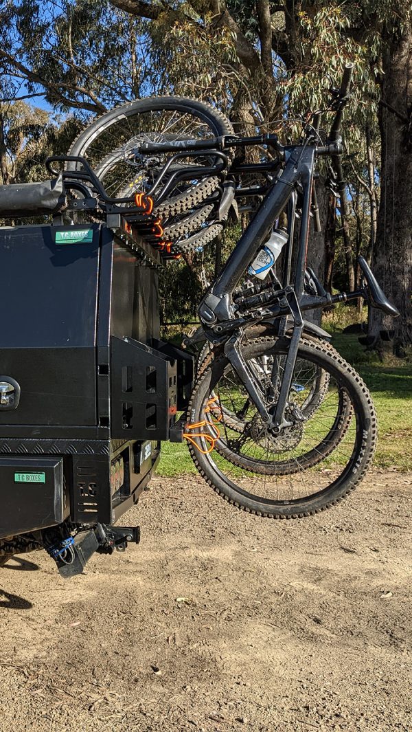 Shingleback Canopy Bike Rack on back of ford ranger with canopy service body